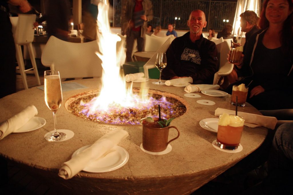 Eat dinner around a fire pit.