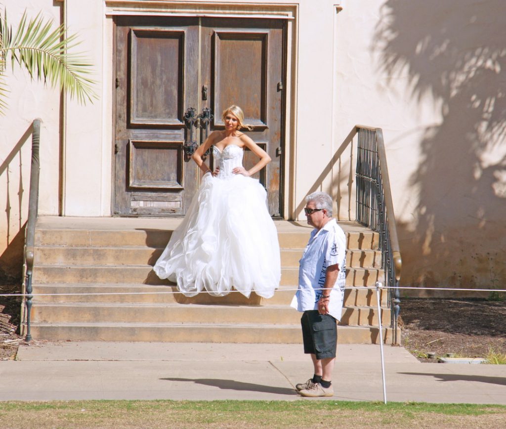 Photobomb a wedding.