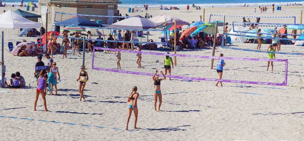 Play volleyball on a team.