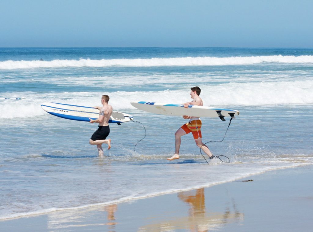 Surf with your friend.