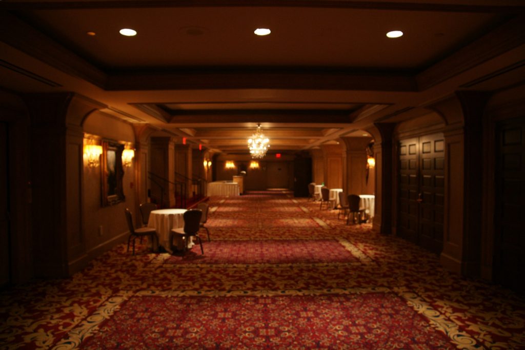 Elegant hallway leading past conference rooms.