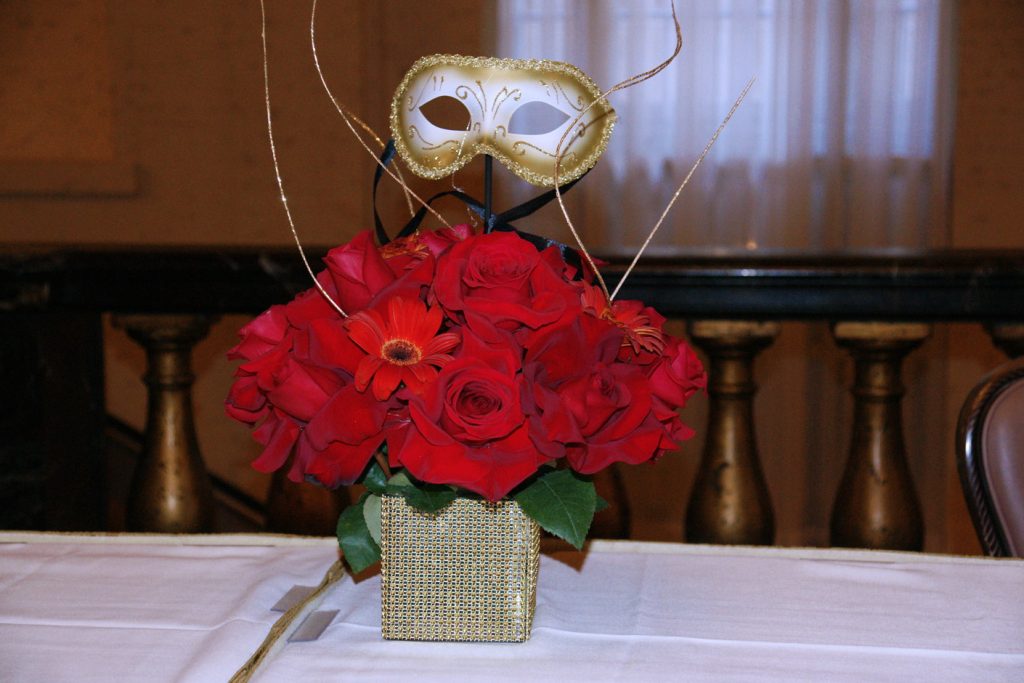 Red roses and a mask…hmmmmmm.