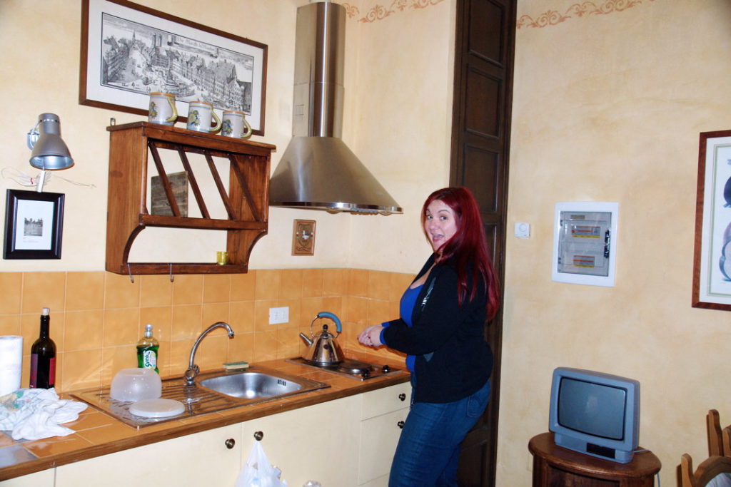 Cooking Italian style (notice the bottle of wine).