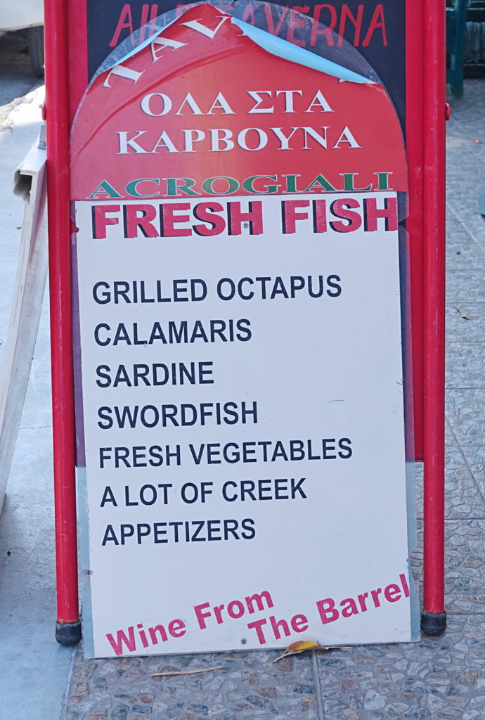 "All on the Charcoal Edge" - We aren't sure if it's appetizers from the creek or from Greece...