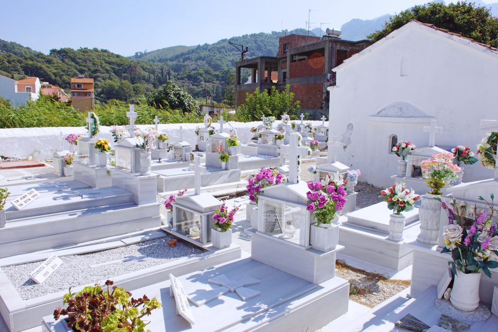 We practice reading in Greek at the local cemetery.