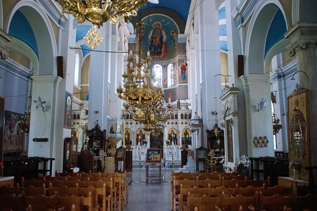 The interior is beautifully decorated in blue and white, the colors most associated with Greece.