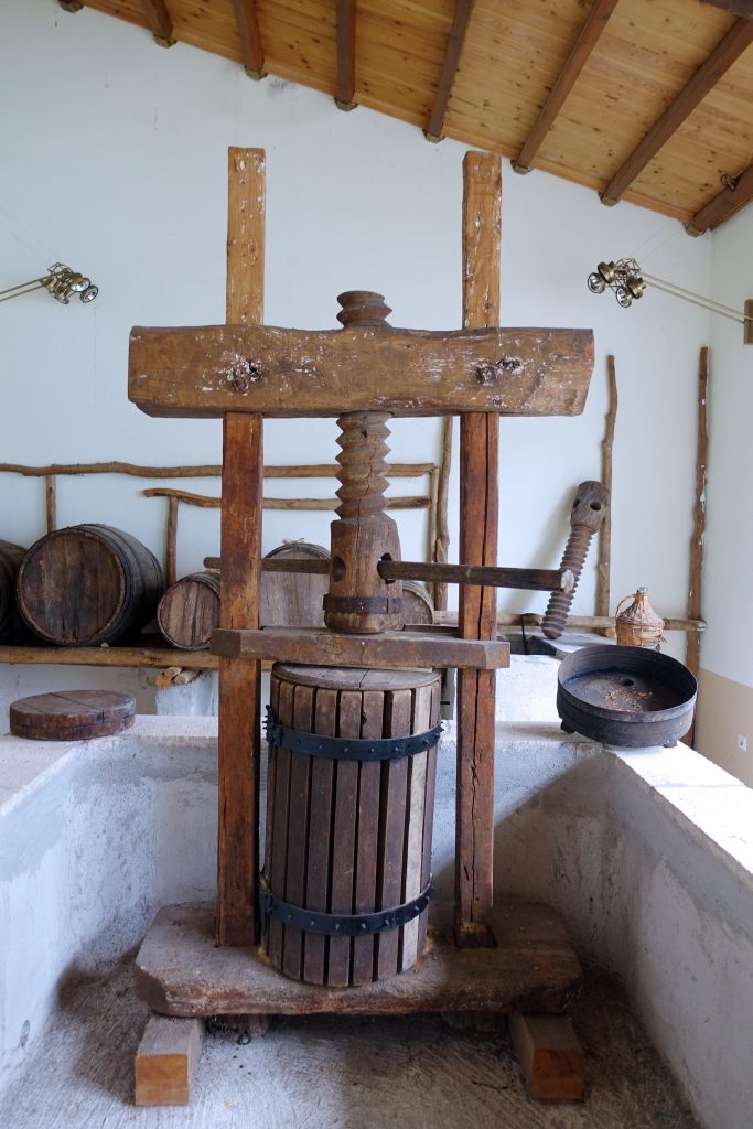 A human-powered wine press, making only a few liters at a time.