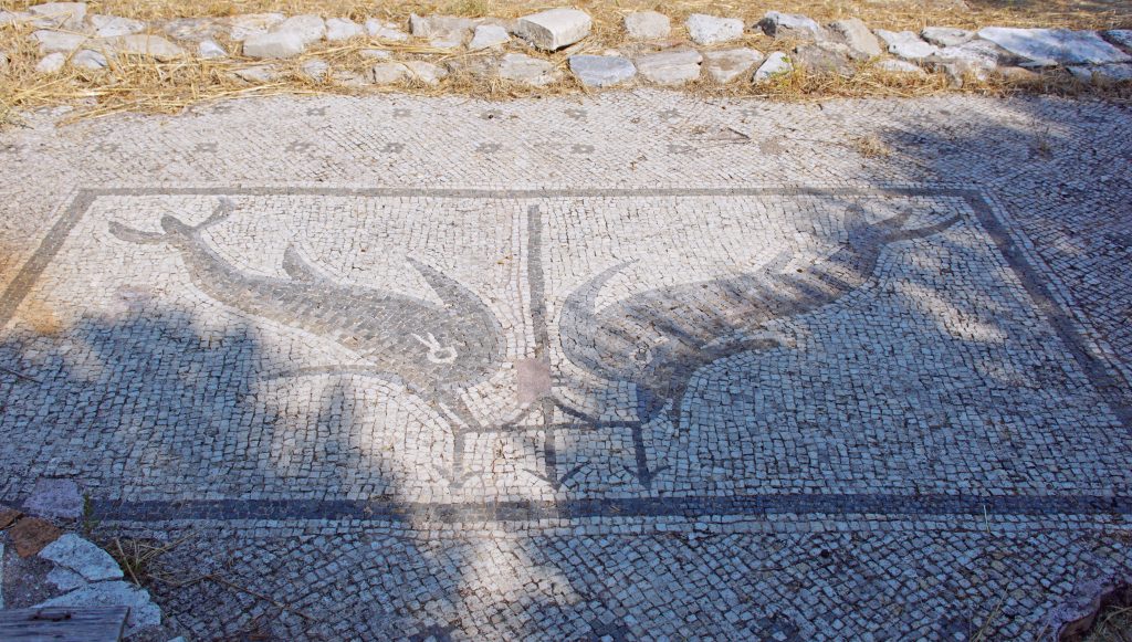 The courtyard, made of black and white marble tesserae, of a  Roman house.