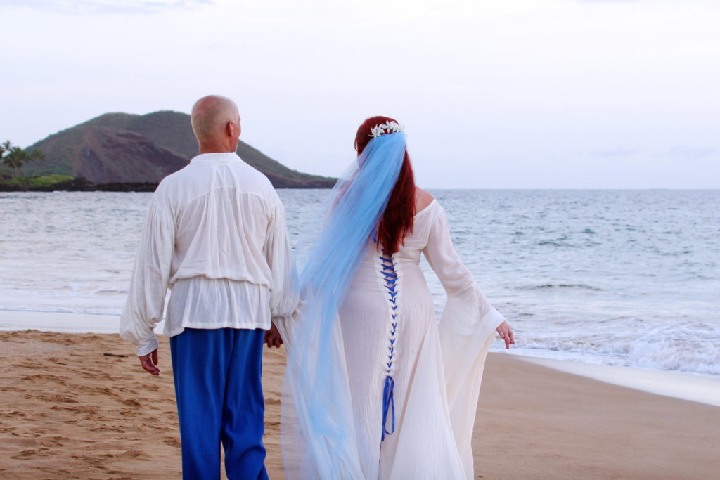 Holding each other’s hand on our beach.