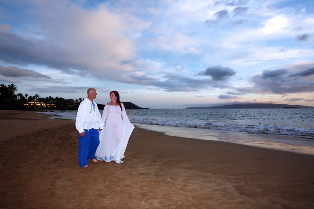 Newlyweds, walking on our private beach.