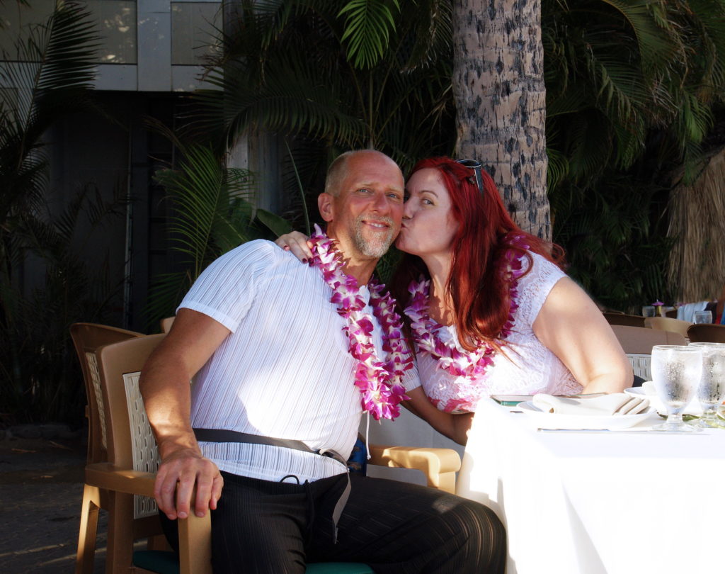 Married in Maui kisses.