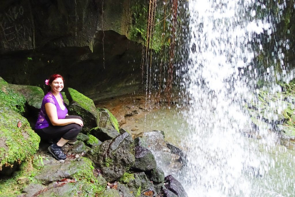 Hiking behind the falls.