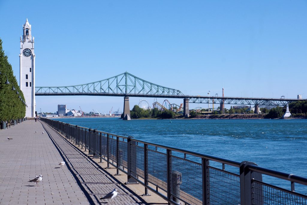 The Montreal Clock Tower and the Jacques Cartier Bridge.