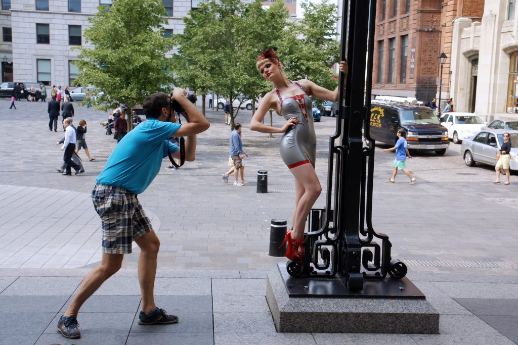 A Montreal lamp post fashion model hard at work.