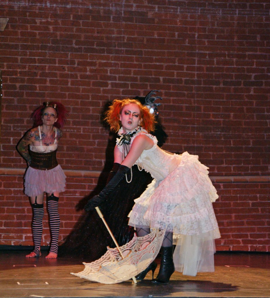 Steampunk performers performing.