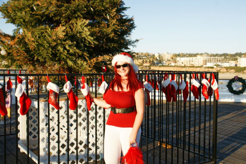 The stockings were hung on the gate surrounding the Christmas tree on Crystal Pier with care...