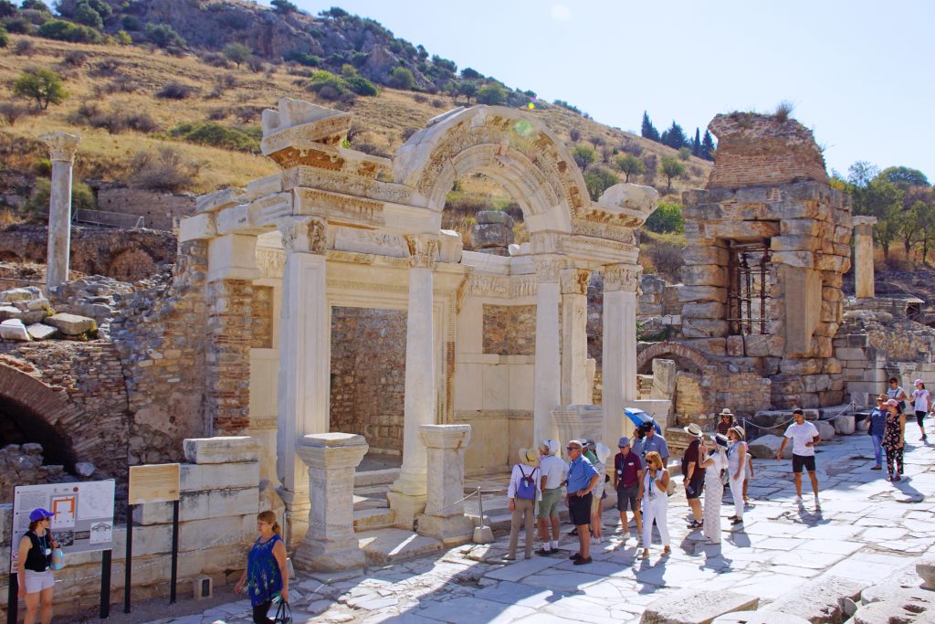 The arches of Hadrian's Temple, displaying intricate designs.