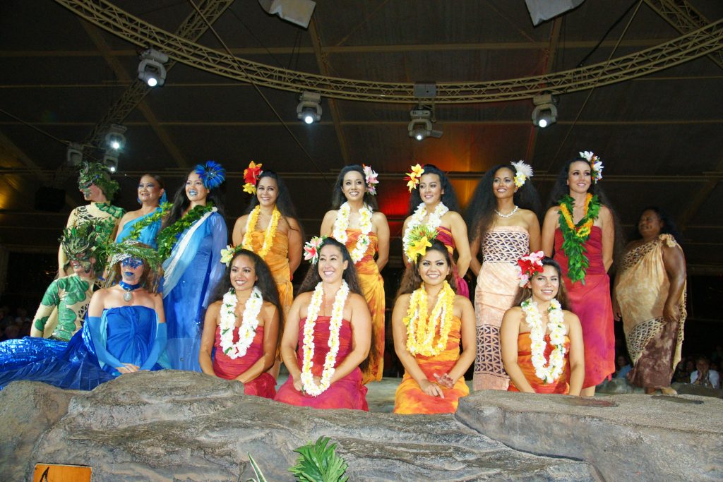 The cast poses for the audience.