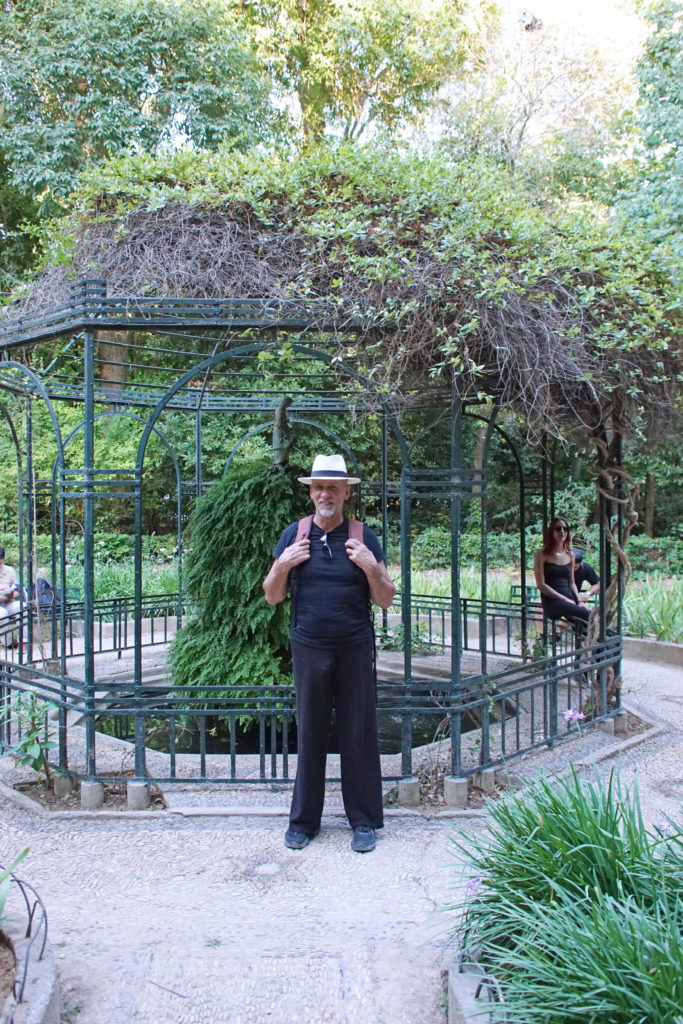 A covered fountain is the perfect place to pose.