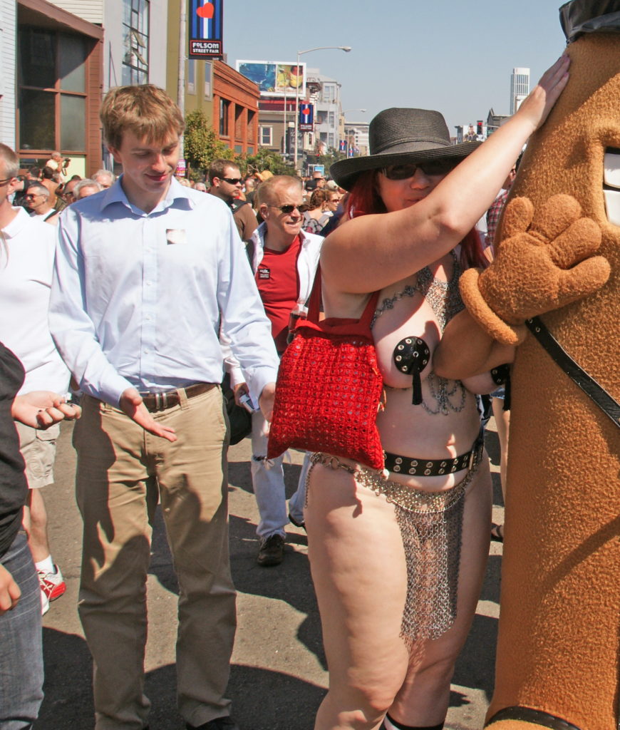 A gentleman appreciates a lady's attire.