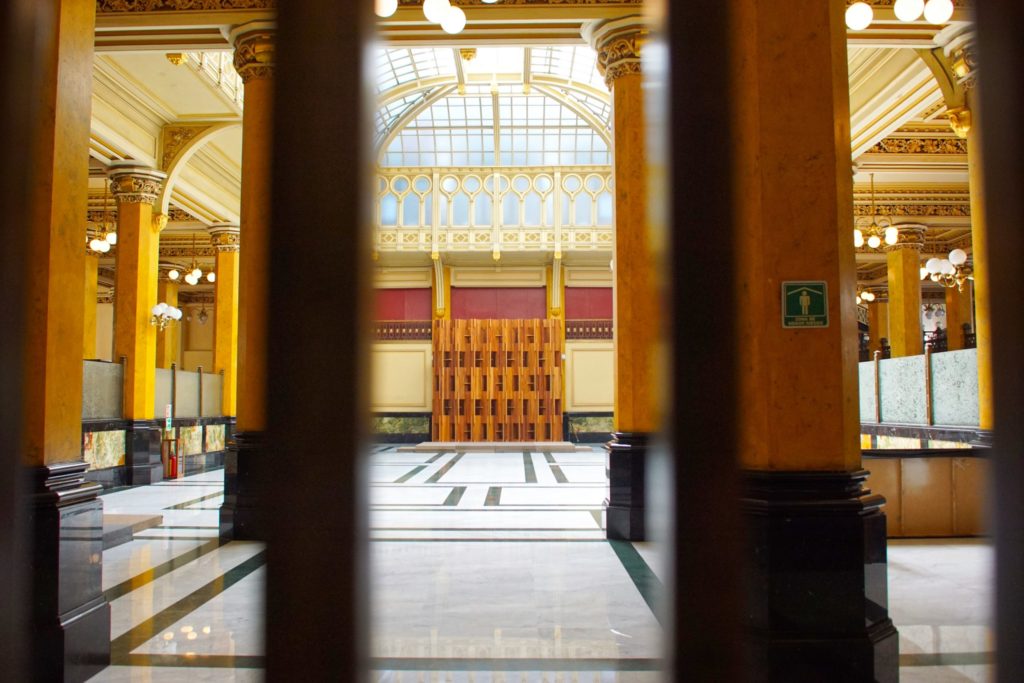 The main postal area, seen through the grating that protects it.