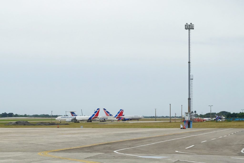 Green countryside surrounds Havana's International airport. 