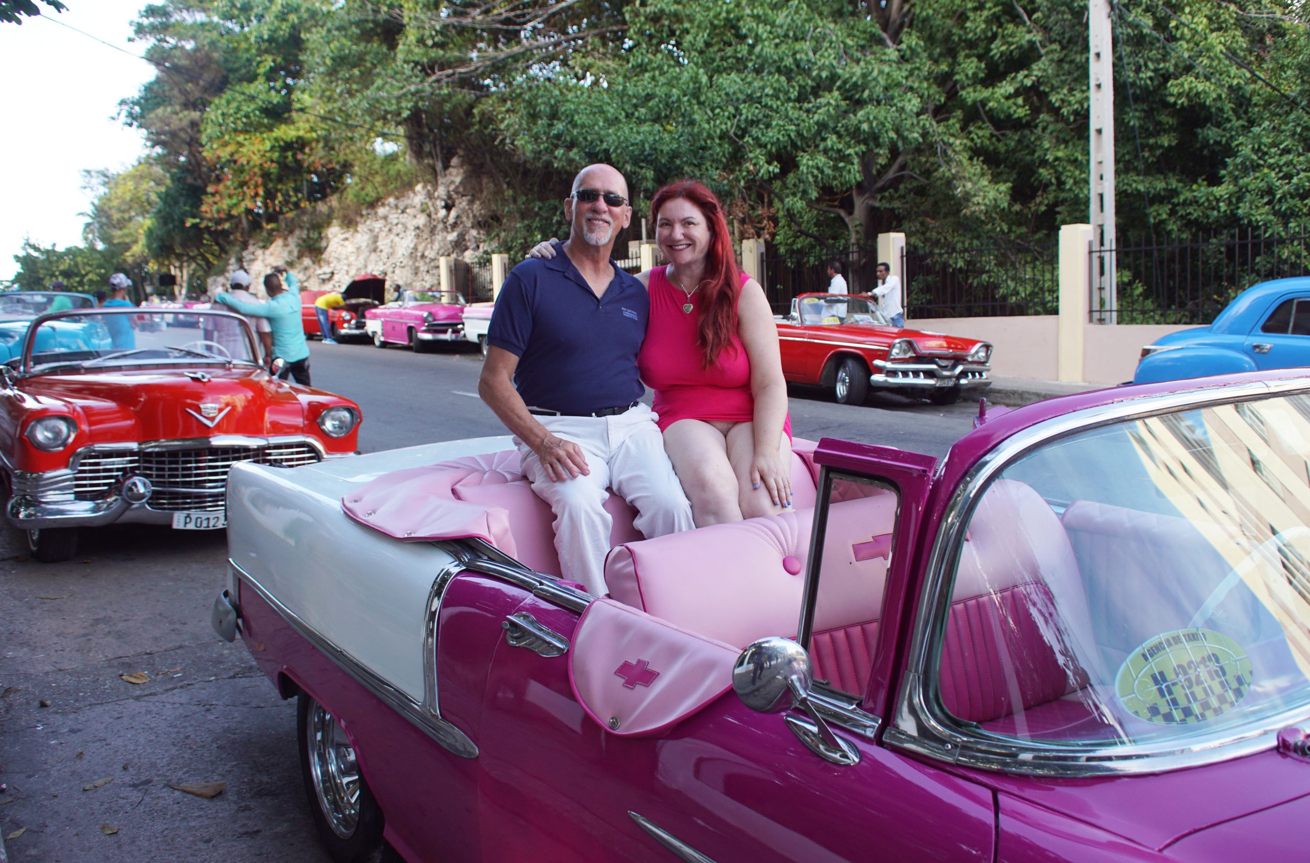 Ready to ride in our pink classic 1955 Chevy convertible!