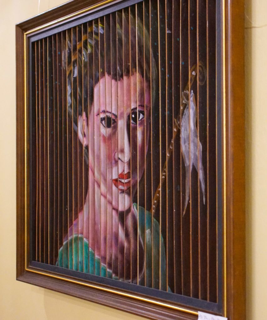 Portrait 1: Unhappy woman in green.