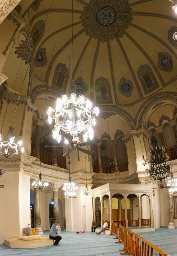 Chandeliers and arches abound.