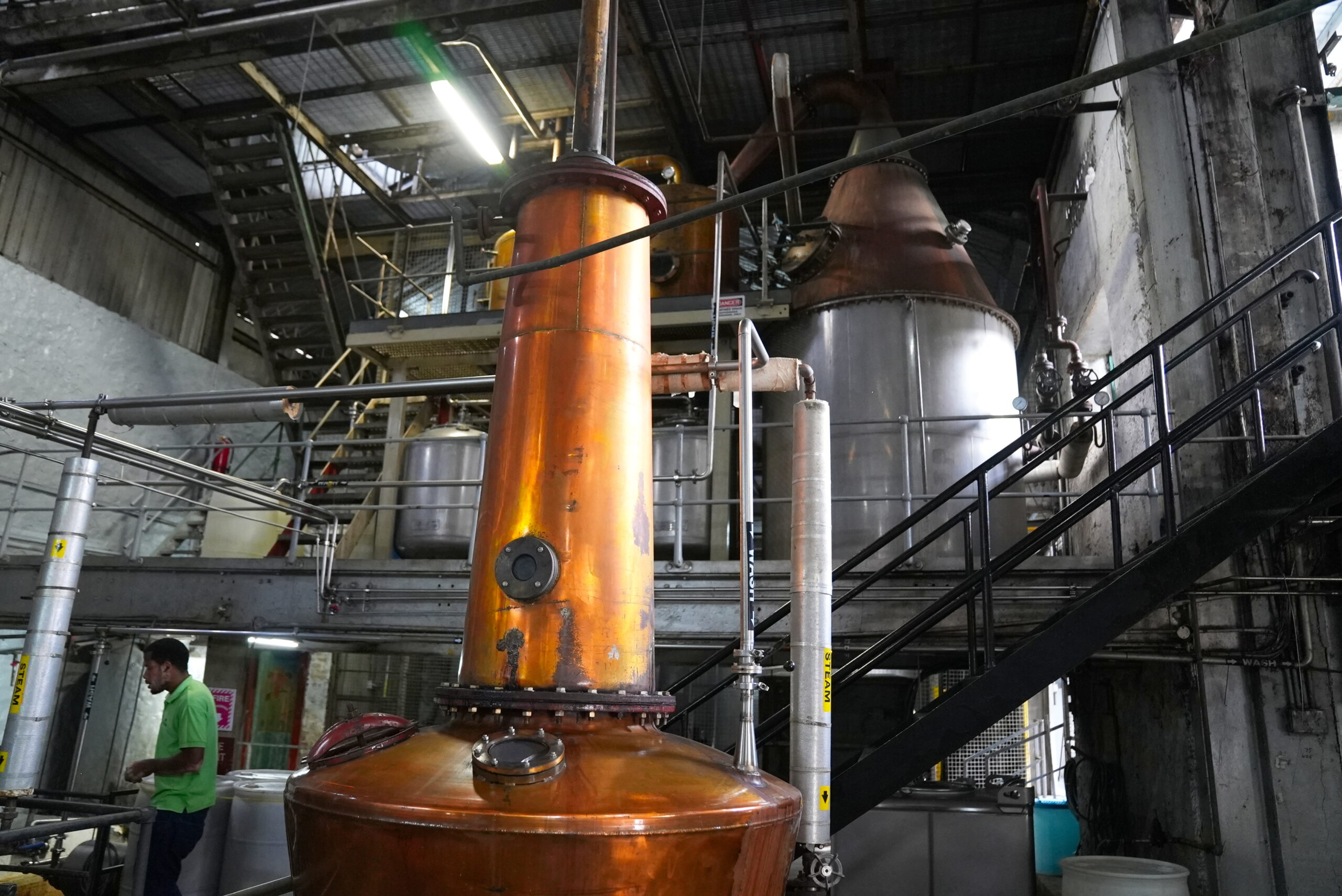 Making rum the old fashioned way.